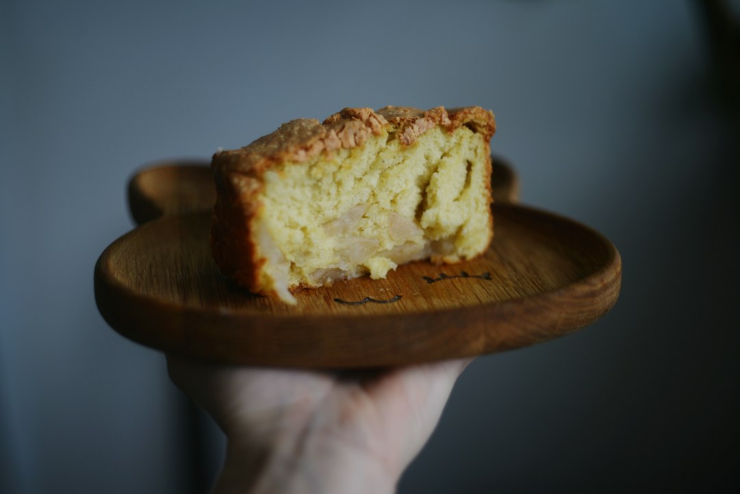 Slices of apple cake with a cinnamon topping