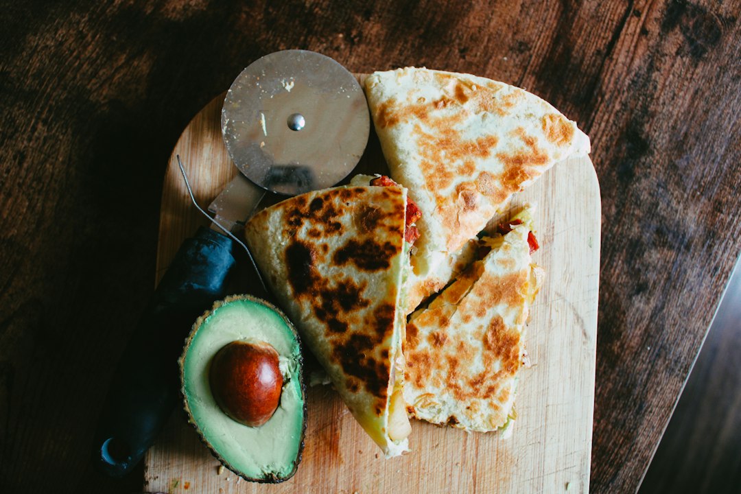 Golden quesadilla wedges on a serving board