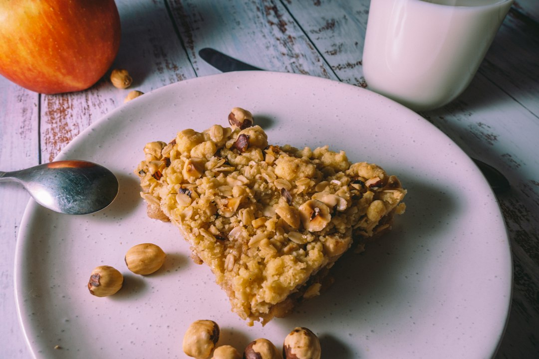 Golden baked oatmeal with fruit and a crisp topping
